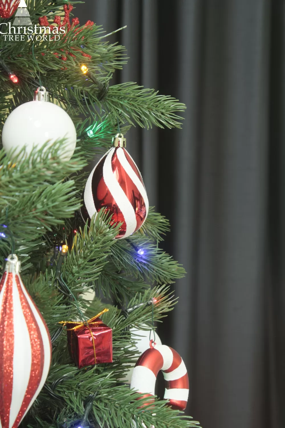 Christmas Tree World The 12ft Ultra Devonshire Fir Pre-lit With Warm White/Multicoloured Colour Change LEDs - NI/IE< Large & Giant Artificial Christmas Trees Ireland | Large & Giant Christmas Trees In Northern Ireland